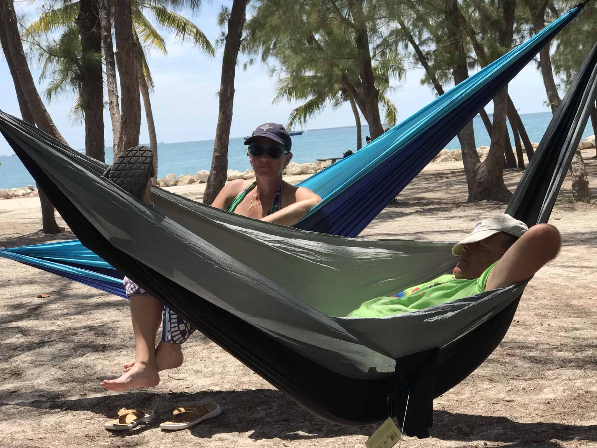 The Lafleurs enjoying some rest in their portable hammocks. 