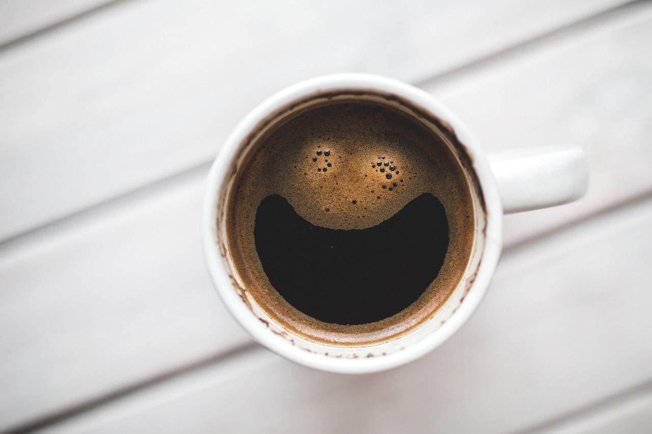 A happy looking cup of coffee. 