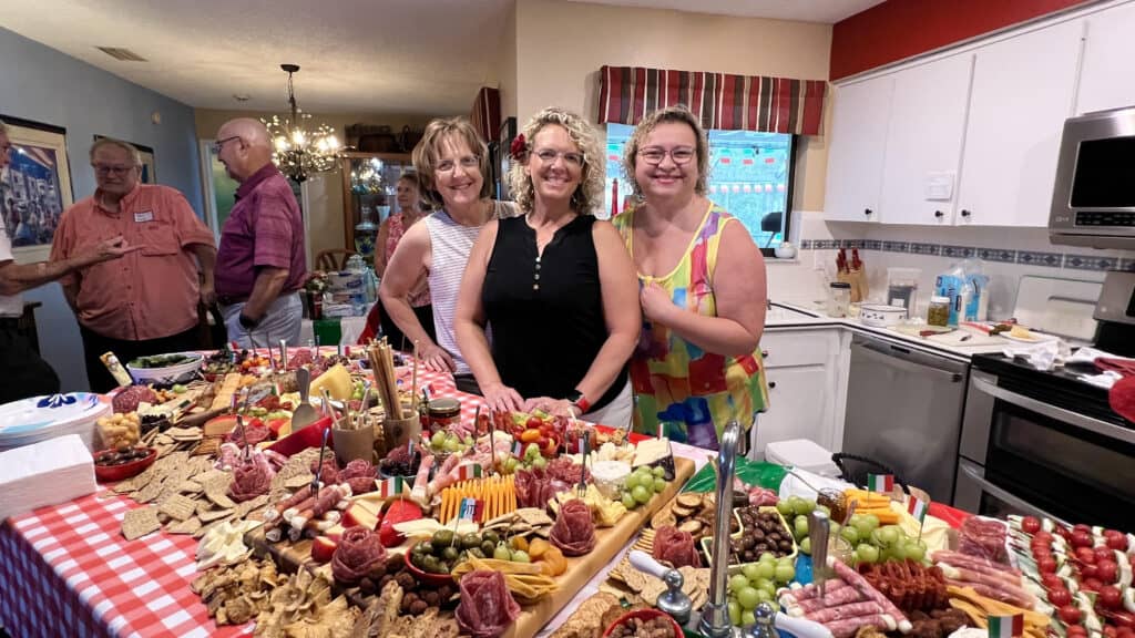 Denise, Steph, and Margaret and the world's largest charcuterie. 